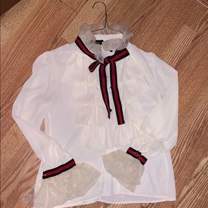Off White Ruffle Shirt With Red and Black ribbons